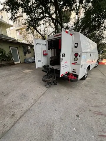 Magnet Plumbing service vehicle on-site for Grease Trap Cleaning in Babbatasset Village